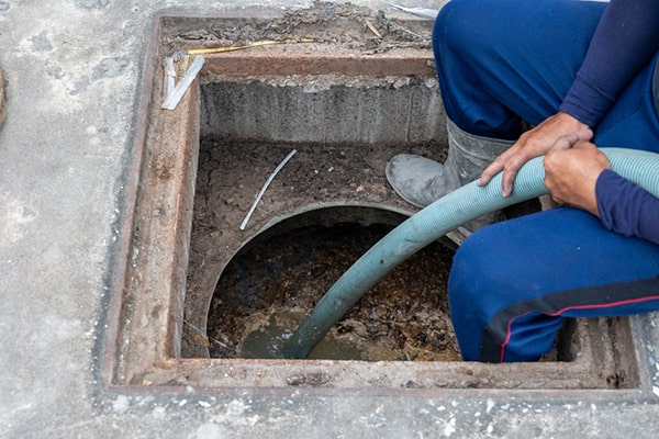 with grease trap pumping, a professional will remove accumulated grease, fats, and oils from the trap to prevent build-up and blockages